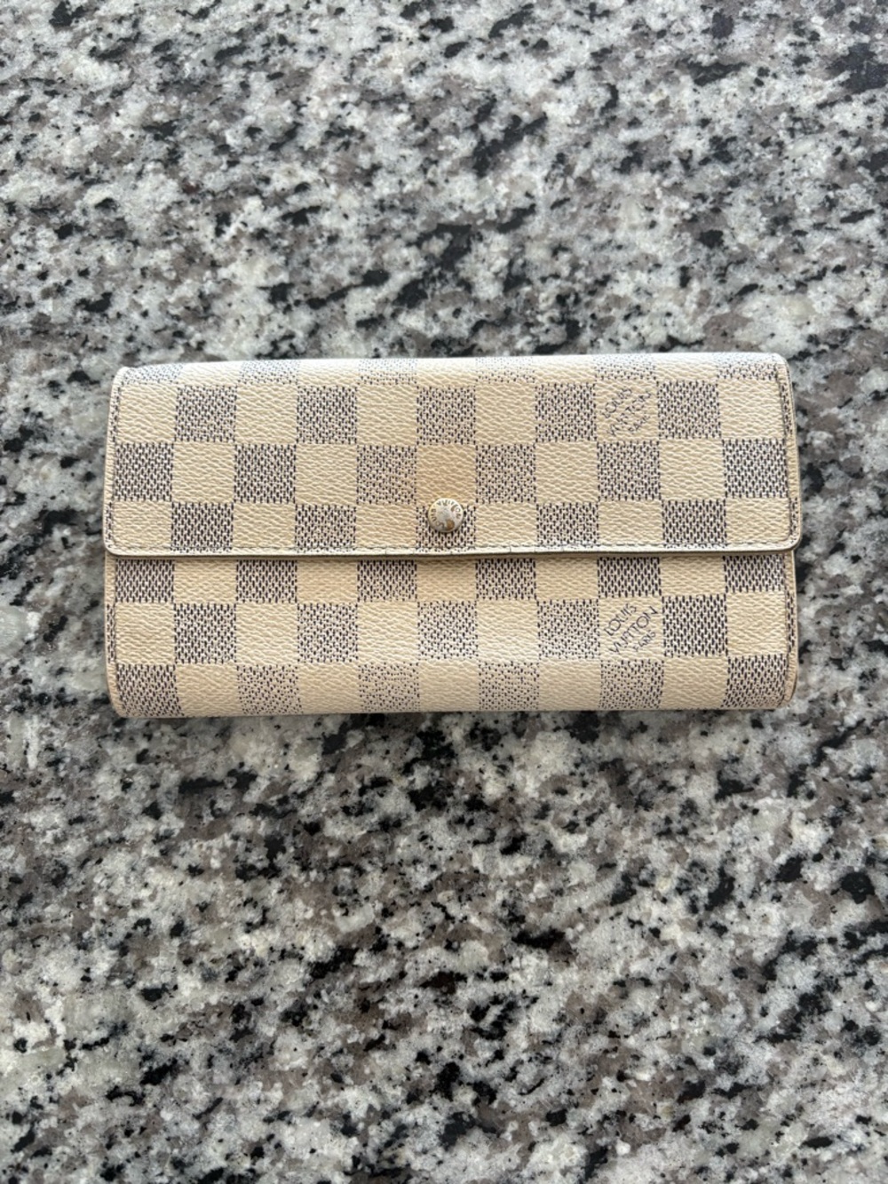 Luis Vuitton Damier Azur wallet.